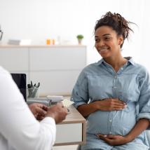 A doctor and a pregnant patient discuss using low-dose aspirin during pregnancy.